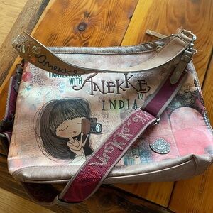 Cute pre owned purse handbag by ANEKKE